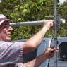 Bob dissembles satellite antena after the event